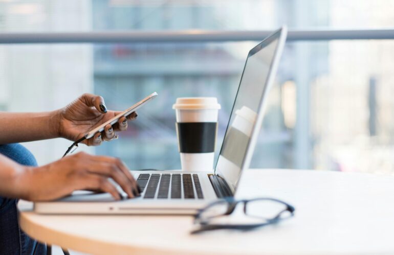 Free laptop on table top stock photo